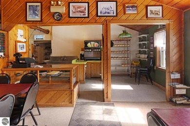 Nestled in the charming historic village of Fife Lake, lies a - photo 4