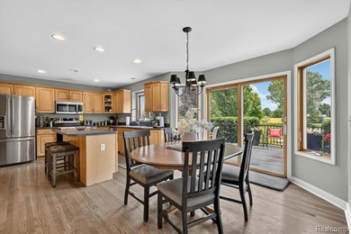 Spacious Fenton home with Hartland Schools set on 2.83 rolling - photo 5