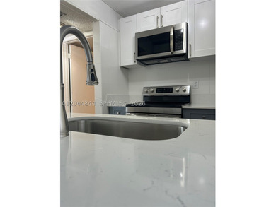 Welcome to this bright and inviting 2-bedroom, 2-bathroom - photo 10