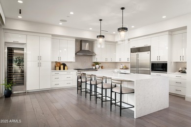 Experience resort-style living in this meticulously maintained