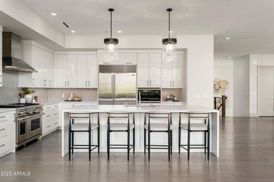 Experience resort-style living in this meticulously maintained