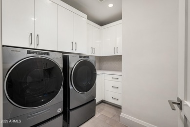 Experience resort-style living in this meticulously maintained