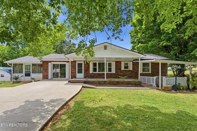 Welcome to 513 Smokey Drive in Loudon, TN! This charming - photo 1