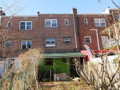 Well-maintained attached brick single- family home located in - photo 14