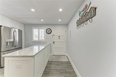 Exceptional location with fabulous water views! Situated on the - photo 9