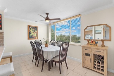 Located in the desirable Pine Island Ridge / Live Oak community