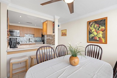 Located in the desirable Pine Island Ridge / Live Oak community