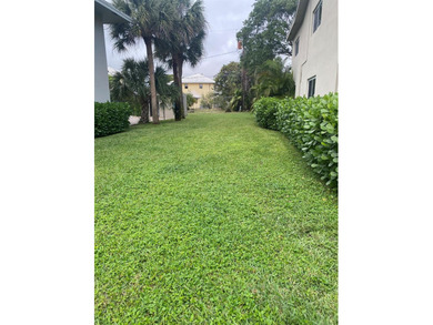 Welcome to this charming 3-bedroom, 2-bathroom condominium - photo 2