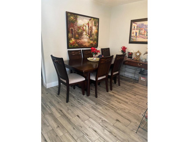 Welcome to this charming 3-bedroom, 2-bathroom condominium - photo 5