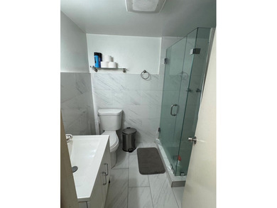 Welcome to this charming 3-bedroom, 2-bathroom condominium - photo 9