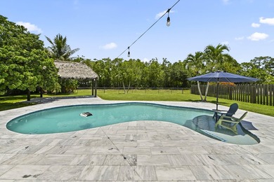 Welcome to 7635 Oakmont Drive in Lake Worth, a charming - photo 2