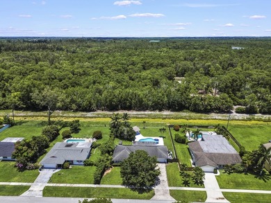 Welcome to 7635 Oakmont Drive in Lake Worth, a charming - photo 4
