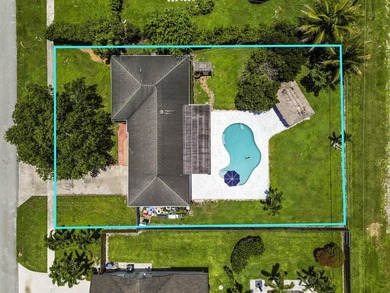 Welcome to 7635 Oakmont Drive in Lake Worth, a charming - photo 5