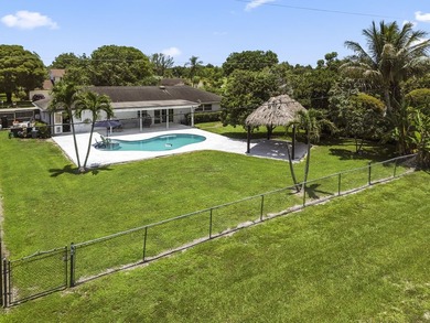 Welcome to 7635 Oakmont Drive in Lake Worth, a charming - photo 6