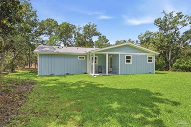 Custom coastal retreat in Gulf Breeze! This thoughtfully - photo 31