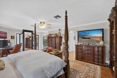 Nestled on over an acre of land in the gated, tranquil golf - photo 32