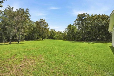 Custom coastal retreat in Gulf Breeze! This thoughtfully - photo 33
