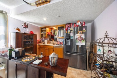 Well maintained home with limited view of Kingswood golf course - photo 23