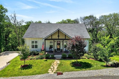 This waterfront lake home showcases an open floorplan and - photo 3