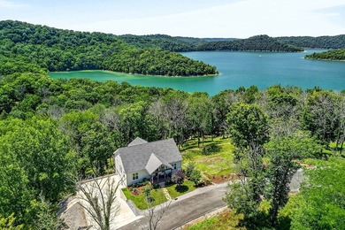This waterfront lake home showcases an open floorplan and - photo 6