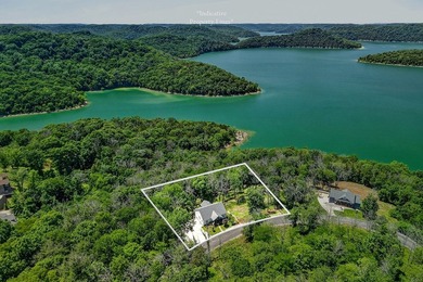 This waterfront lake home showcases an open floorplan and - photo 7