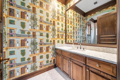 This custom-built home sits on more than two-thirds of an acre - photo 28