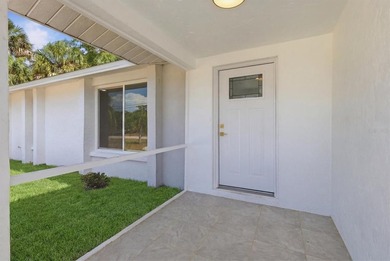 Experience modern Florida living in this completely remodeled - photo 3