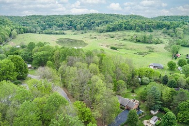 Discover the charm of this scenic, wooded lot nestled in the - photo 6