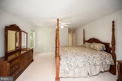 Nestled among mature green trees in the gated Lake of the Woods - photo 17
