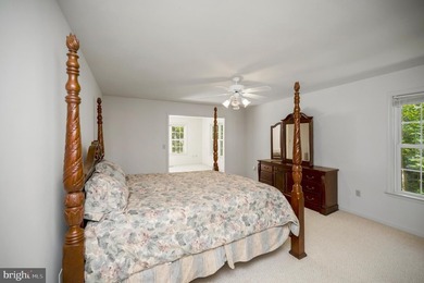 Nestled among mature green trees in the gated Lake of the Woods - photo 18