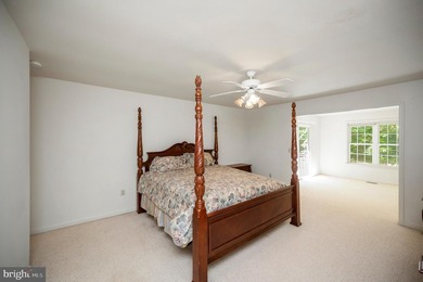 Nestled among mature green trees in the gated Lake of the Woods - photo 19