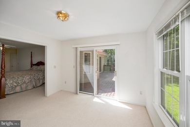 Nestled among mature green trees in the gated Lake of the Woods - photo 20
