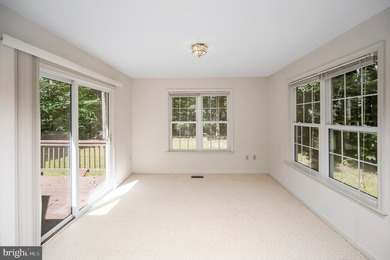 Nestled among mature green trees in the gated Lake of the Woods - photo 21