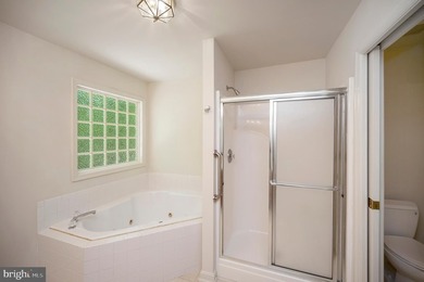 Nestled among mature green trees in the gated Lake of the Woods - photo 24