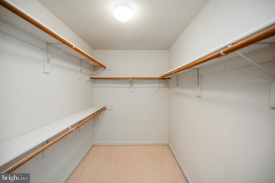 Nestled among mature green trees in the gated Lake of the Woods - photo 25