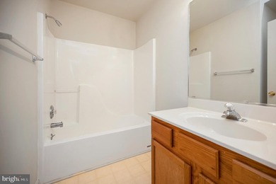 Nestled among mature green trees in the gated Lake of the Woods - photo 28