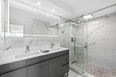 Stunning top-floor corner unit offering breathtaking wraparound - photo 8