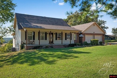 Beautiful home with seasonal view of White River - Lake Home For Sale in Cotter, Arkansas