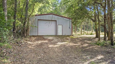 Experience lakeside living with two waterfront lots in the quiet - photo 30