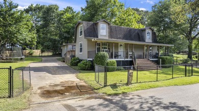 Experience lakeside living with two waterfront lots in the quiet - photo 32
