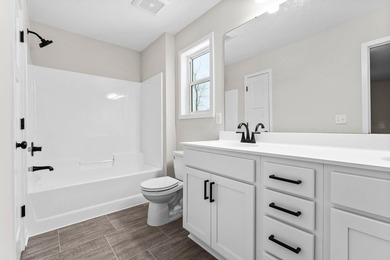 This stunning two-story new construction offers a perfect blend - photo 32