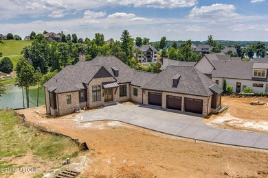 Nearly completed new construction on a premier lakefront - photo 2