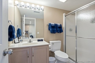 This beautifully updated condo sits high above the lake with - photo 13