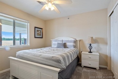 This beautifully updated condo sits high above the lake with - photo 14