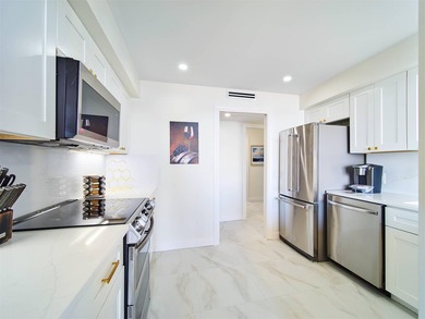 Sophisticated, elevated, and fully reimagined, this 2-bedroom - photo 14
