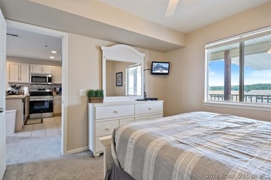This beautifully updated condo sits high above the lake with - photo 16