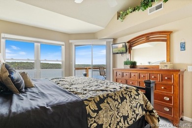 This beautifully updated condo sits high above the lake with - photo 18