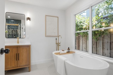 Situated on a picturesque tree-lined street and located down a - photo 19