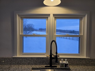 Kitchen has been remodeled, with new, cabinets, flooring and - photo 19