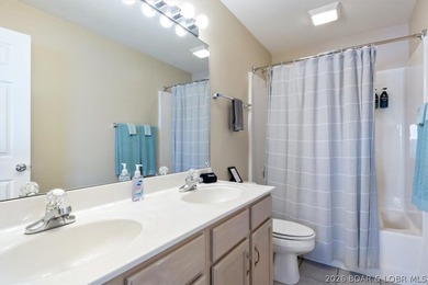 This beautifully updated condo sits high above the lake with - photo 21
